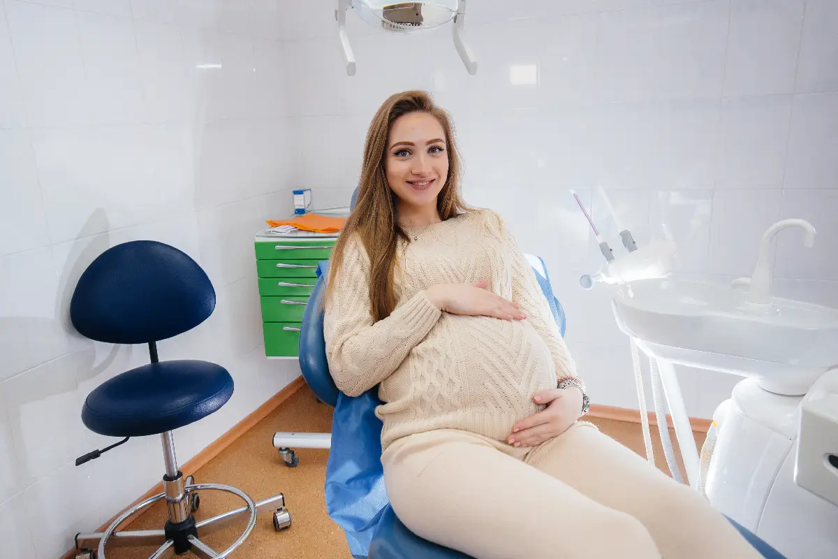 A pregnant woman having a dental appointment